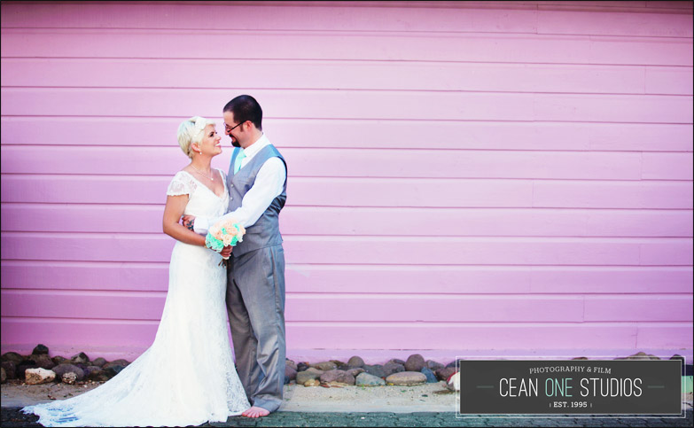 bride and groom in front of pink wall | Cean One Photography| Southern California Wedding Photographer | destination & portrait photographer