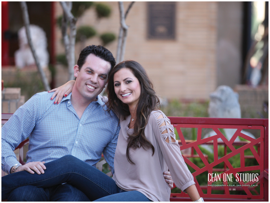 engaged couple on red bench   | Cean One Photography | Southern California Photographers | love story 