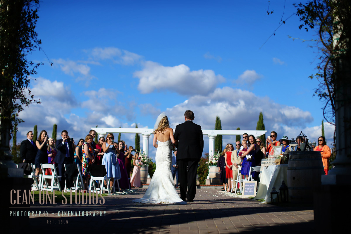 bride walking down isle blue sky | Mount Palomar Winery Photography | Cean One Wedding Photography | Southern California Wedding Photographer